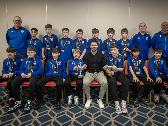 Special guest Stephen McKendry presenting Oxford United U-12swith their trophies at the Annual D&D Youth FA awards on Friday night. Included are coaches Francis Duffy, Christopher Doherty and Shaun Doherty.. (Photos: Jim McCafferty Photography)