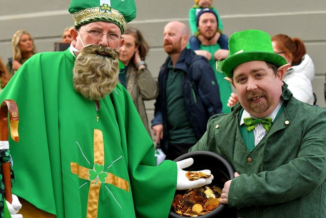 St Patrick and leprechaun with a crock of gold at Derry‘s St Patrick’s Day parade on Friday afternoon. Photo: George Sweeney. DER2311GS – 56