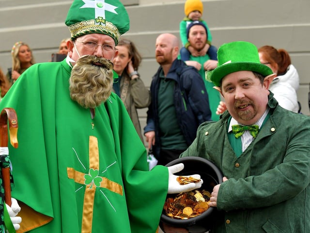 St Patrick and leprechaun with a crock of gold at Derry‘s St Patrick’s Day parade on Friday afternoon. Photo: George Sweeney. DER2311GS – 56