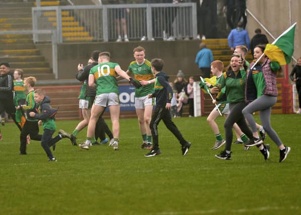 Players and fans of Watty Graham’s Glen, celebrate their SFC final win over Slaughtneil in Celtic Park, on Sunday afternoon. DER2243GS – 018
