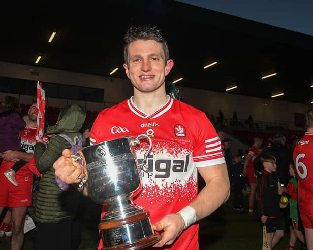 Derry captain Cormac O’Doherty with the Division 2B trophy after victory over Tyrone. Photo: George Sweeney