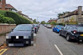 Cars lining the street along narrow Aberfoyle Crescent South last October.