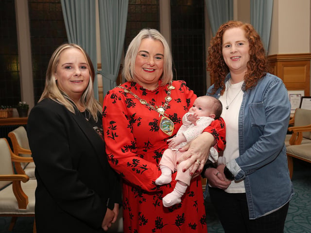 The Mayor Derry, Councillor Sandra Duffy with former service users Rachel Harkin and Rebecca Bishop, at the reception in the Guildhall to mark the 20th anniversary of Shepherd’s View Young Parents Project.