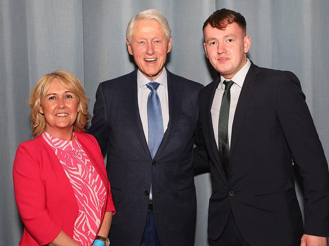 Bill Clinton with Sinn Féin MLAs Ciara Ferguson and Pádraig Delargy.