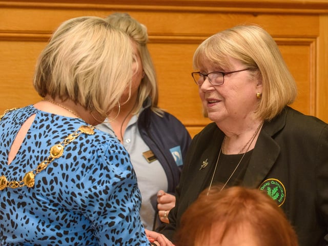 The Mayor Councillor Sandra Duffy with musical director Sheila Carlin when she welcomed the members of Colmcille Ladies Choir to a reception in the Guildhall as they mark their 50th Anniversary. Picture Martin McKeown. 20.01.23:.