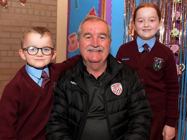 Martin Dunne with Shea and Erin at St John’s PS Grandparents Vintage Tea. Photo: George Sweeney