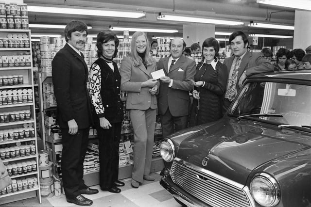 Mr. Wylie Kelly, managing director, of Kelly's Supermarket, Spencer Road, during the visit of Mary Peters, with, from left, Greg Ferris, Margaret McShane, Hazel Ferris and Ray Brogan.