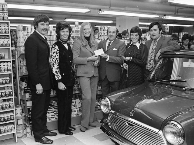 Mr. Wylie Kelly, managing director, of Kelly's Supermarket, Spencer Road, during the visit of Mary Peters, with, from left, Greg Ferris, Margaret McShane, Hazel Ferris and Ray Brogan.