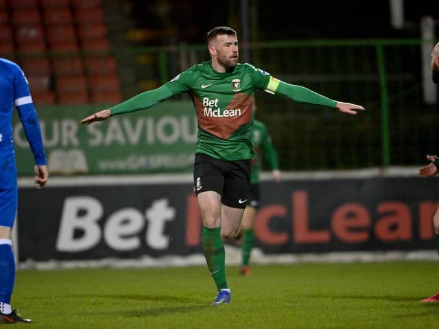 Glentoran's Patrick McClean celebrates scoring against Dungannon Swifts. Picture by ©INPHO/Stephen Hamilton