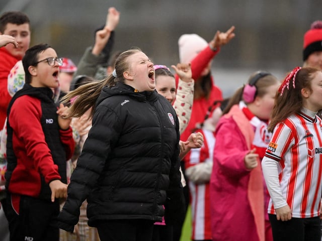 Ardnashee School and College students perform on the pitch.