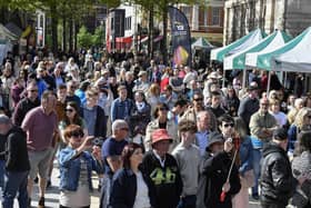 Revellers enjoy the sunshine and the music in Guildhall Square during the Jazz Festival.  Photo: George Sweeney
