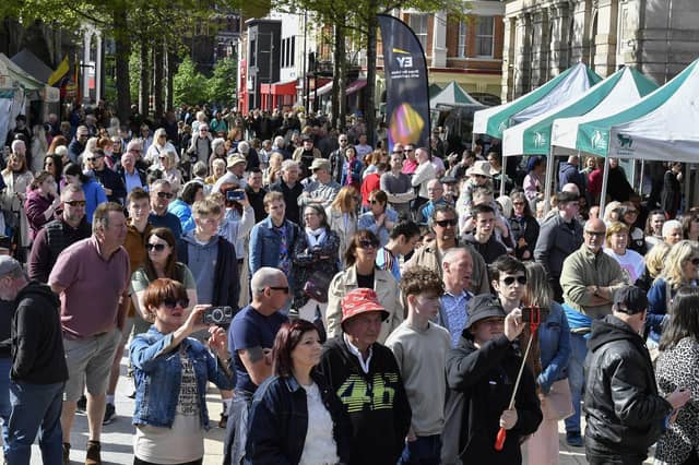 Revellers enjoy the sunshine and the music in Guildhall Square during the Jazz Festival. Photo: George Sweeney