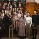 Sandra Biddle and daughter Blathnaid Biddle with members of the Foyle School of Speech and Drama at a mayoral reception with former Mayor, Sandra Duffy.