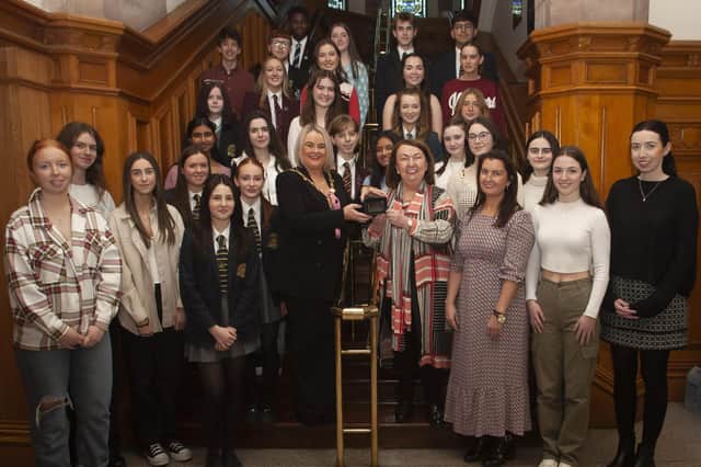 Sandra Biddle and daughter Blathnaid Biddle with members of the Foyle School of Speech and Drama at a mayoral reception with former Mayor, Sandra Duffy.