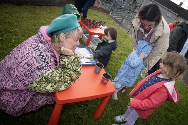 Children taking part in planting some flowers during Thursday's event.
