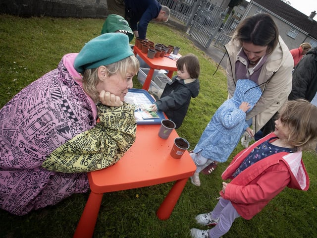 Children taking part in planting some flowers during Thursday's event.