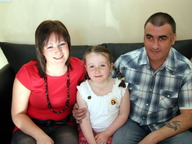 Birthday girl Caitlin pictured with her dad Gerry and sister Carla at her 7th birthday party 0007JML : Parties and celebrations April 2006: Kaitlin Quigg.