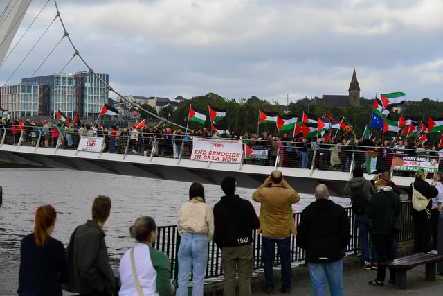 People gathered on the Peace Bridge for a Vigil for Gaza on Friday evening, organised by the Derry Irish Palestinian Solidarity Campaign. Photo: George Sweeney