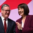 LIVERPOOL, ENGLAND - SEPTEMBER 23: Prime Minister Keir Starmer and Chancellor of the Exchequer, Rachel Reeves seen on stage during the Labour Party Conference 2024 at ACC Liverpool on September 23, 2024 in Liverpool, England. (Photo by Leon Neal/Getty Images)