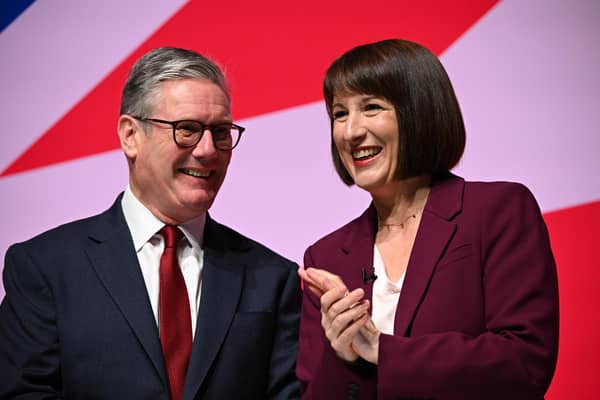 LIVERPOOL, ENGLAND - SEPTEMBER 23: Prime Minister Keir Starmer and Chancellor of the Exchequer, Rachel Reeves seen on stage during the Labour Party Conference 2024 at ACC Liverpool on September 23, 2024 in Liverpool, England. (Photo by Leon Neal/Getty Images)