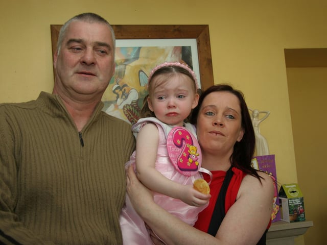 Orlaigh pictured with her mum Ann and dad James on the occasion of her 2nd birthday 0029JML : Parties and celebrations April 2006: Orlaigh Kelly.