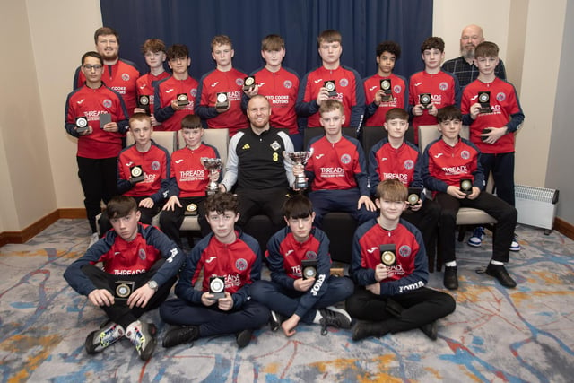 Ronan O'Donnell, Irish Football Association, special guest, presenting Clooney FC u-13s with the League Trophy and the Summer Cup at the D&D Youth Awards at the City Hotel on Friday night last. Included are coaches Ally Colhoun and Thomas Nelson.