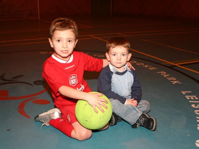 Birthday Boy Aidan with Jack taking a rest at half time. 2153/dd : Parties and celebrations January 2006: Aidan Dunne.