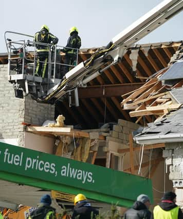 Emergency services continue their work at the scene of an explosion at Applegreen service station in the village of Creeslough in Co Donegal.