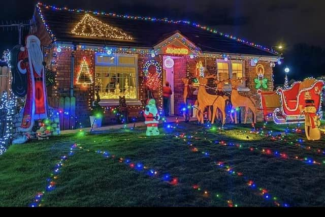 Amelia Court residents decorate their street every year to raise money for charity.