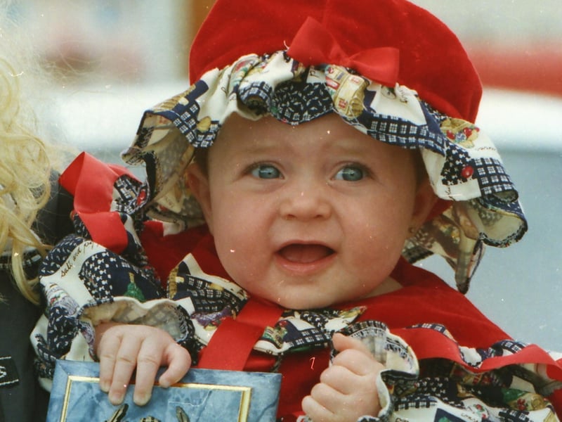 Laura McCarron, Greenwalk, winner of the overall Bonny Baby competition, at the Creggan Festival Parade.