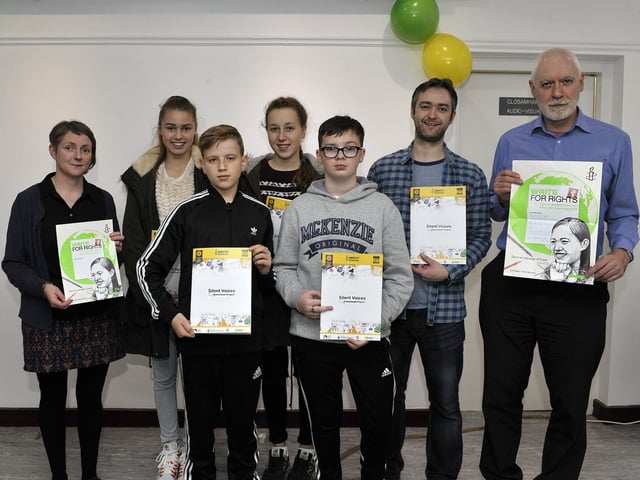 Pictured at the launch of the ‘Silent Voices’ Comic Book Project in Eden Place Arts Centre are, back from left, Judi Logue (Eden Arts Centre), Jusre Artrauskyte, Dangiras Astrauskis, Danny McLaughlin project leader from Revolve Comics and Kevin Abbott from Foyle Amnesty. At the front are Coustre Malinauskaik (left) and Tony Logue. Youths from both the Glenview Youth Group and the Cedar Foundation participated in the project. DER5015GS057