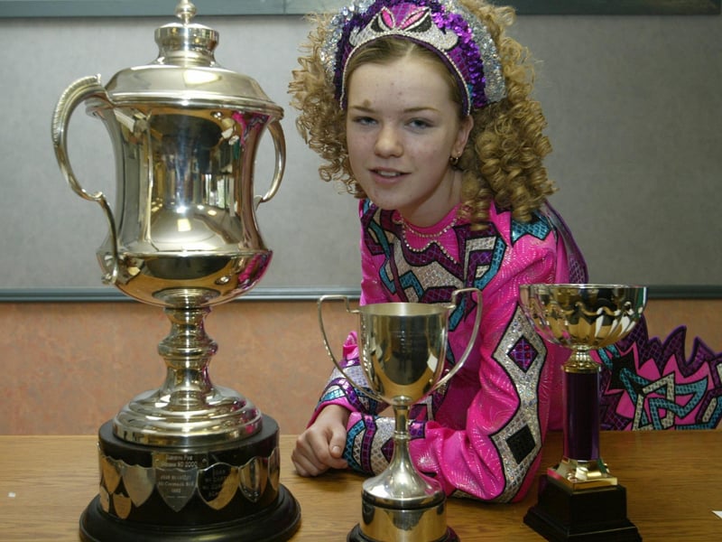 14 yr old Aisling McGill, a pupil of the McLaughlin school of dance who won the Carter Cup at Ballymahon, Co. Longford.  Aisling also won the Open under 14yrs championship at the recent Dubh-Linn Feis in LOndon and the under 15 yrs Championship.  (1107JB80):These Irish Dancing champions were featured in the 'Journal' in 2003 marking their achievements.