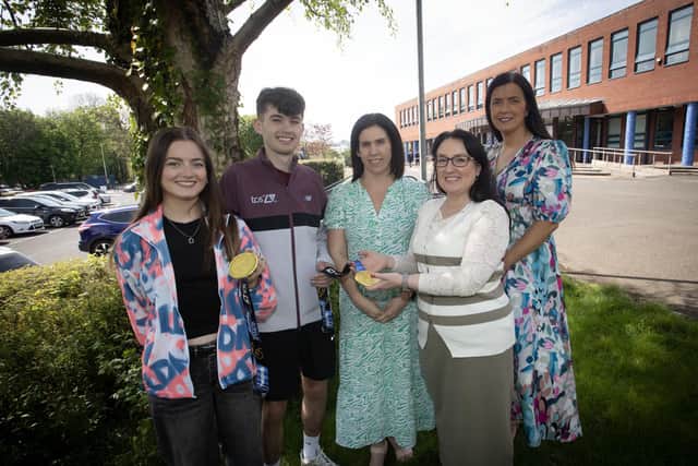 Sam Brattin pictued with his girlfriend Meabh O'Sullivan, Mrs. Denise Duffy, Year Head, Mrs. Caroline McLaughlin, Principal and Mrs. Michaela Doherty, Maths Teacher during last week's visit to St. Columb's. (Photos: Jim McCafferty Photography)