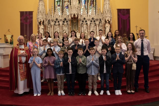 Mr. Dee Herron's P7 class at Good Shepherd Primary School who received the Sacrament of Confirmation from Fr. Michael Canny at Chapel Road Church on Friday last. Included in photo is Mrs. Suzann McCafferty, Principal and Ms. Catherine Maguire, Classroom Assistant. (Photos: Jim McCafferty Photography)