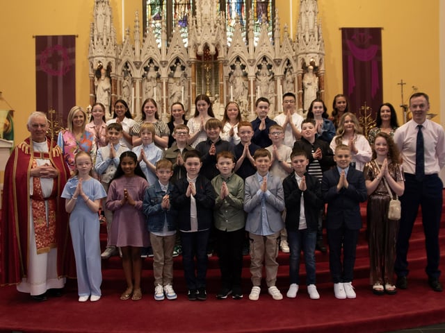 Mr. Dee Herron's P7 class at Good Shepherd Primary School who received the Sacrament of Confirmation from Fr. Michael Canny at Chapel Road Church on Friday last. Included in photo is Mrs. Suzann McCafferty, Principal and Ms. Catherine Maguire, Classroom Assistant. (Photos: Jim McCafferty Photography)