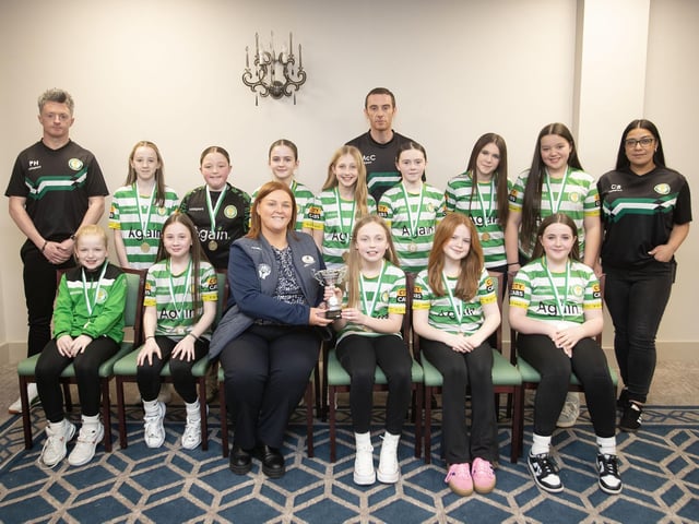Top of the Hill Celtic u-11s receive the Winter Cup from Charlene Morrow, Derry Credit Union, at the D&D Youth FA awards at the Waterfoot Hotel on Sunday night last. Included are coaches Pajo Hamilton, Ciaran McCloskey and Caoili Bradley. (Photos: Jim McCafferty Photography)
