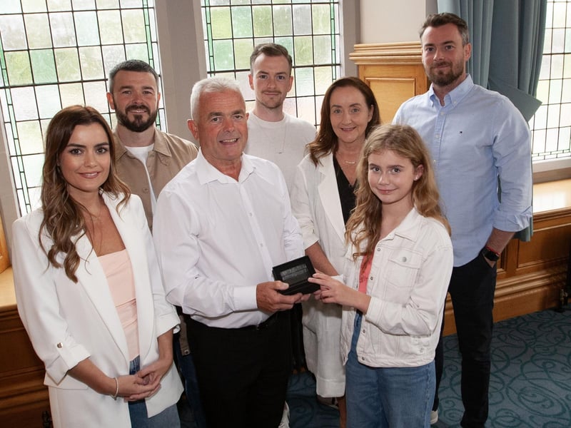Retired bus driver Vincent Morrison pictured with his family at the Guildhall on Thursday evening.