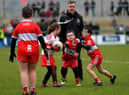 ARE YOU WATCHING, RORY? Some of the children who took part in a football game during half-time at Owenbeg on Sunday.  Photo: George Sweeney. DER2312GS – 32