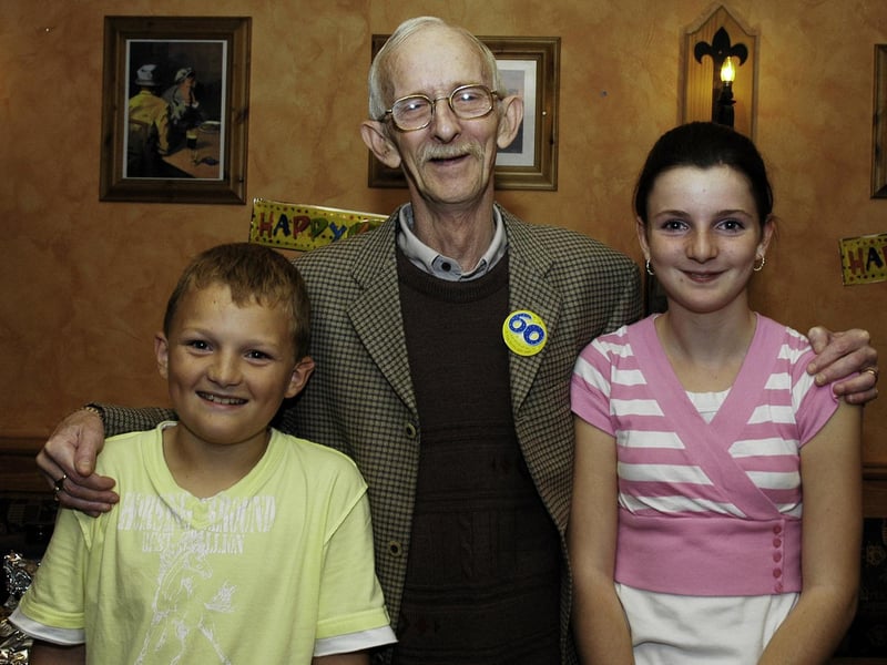 Pat pictured with his grandchildren Jennifer and Connor.                                 : .