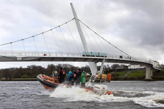 A picture of top marine scientists on a field trip on the Foyle.