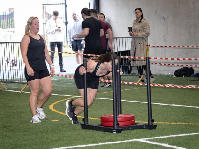 Team switchover on the Sled Push on Sunday.