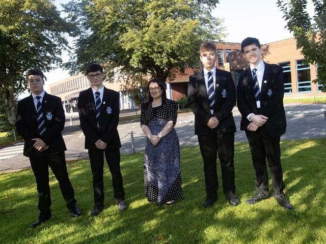 St. Columb's College Top GCSE prizewinners in one subject pictured with Mrs. Caroline McLaughlin, Principal on Friday morning last. From left are Logan Davis-Moran, The Paul Wilkins Award for English Literature, Rhys Fallon, Engineering (co-winner), Mateusz Szczech, Business Studies and Conor Devine, Engineering (co-winner).