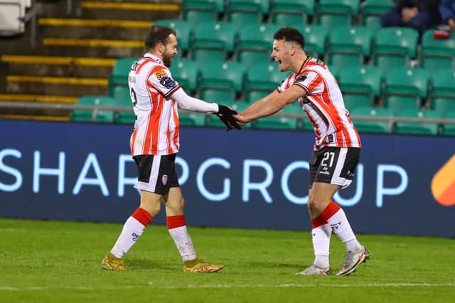FLYING SCOTS . . .  Danny Mullen and Paul McMullan celebrate in Tallaght on Monday.