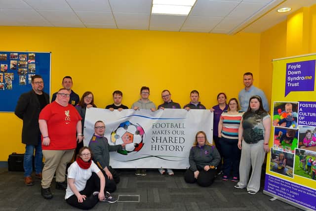 Group pictured in the Foyle Down Syndrome Trust’s offices in The Shared Future centre, Waterside, at the launch of the National Children’s Football Alliance sponsored ‘Football makes our Shared History ‘project.  Included in the photograph are Ernie Brennan, managing director, National Children’s Football Alliance, on the left, staff members Conor McGilloway and Sue McElwee and Christopher Cooper, manager FDST. Photo: George Sweeney.  DER2206GS – 066