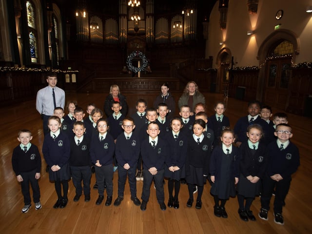 Pupils from Long Tower PS are given a tour of the Guildhall on Thursday morning.