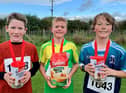 Tiarnan McKenna, St Canice's PS, Davin Gallagher, Ballykelly PS, Liam Wilson, Mill Strand IPS