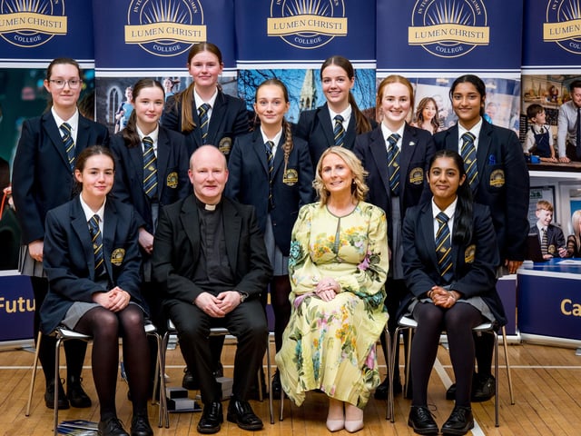 Pupils who achieved 10 or more A* grades in GCSE Examinations pictured with Fr Gerard Mongan (Board of Govenors) & Mrs Brónach O’Hare (Vice Principal).