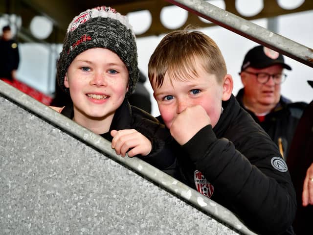 A fist pump from this young Derry City fan and his friend as the Candy Stripes return to winning ways against Dundalk.