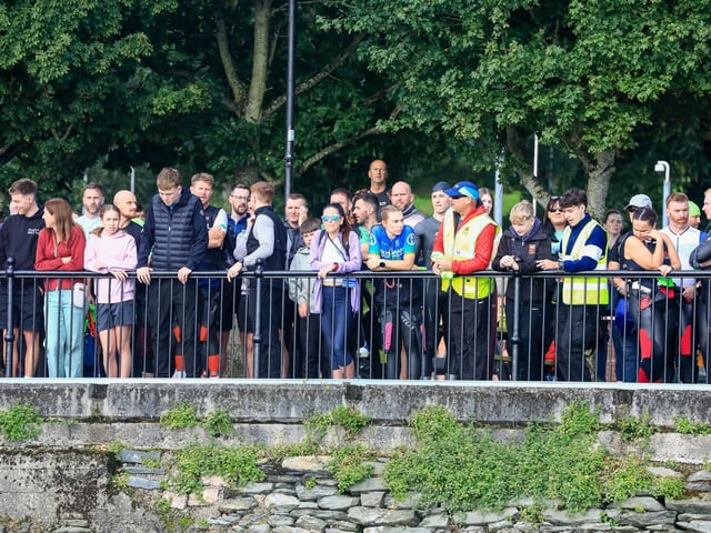 Spectators line the docks as the  Europe Triathlon Cup Junior Men race gets on its way in the River Foyle on Saturday morning. (Photo - Tom Heaney, nwpresspics)