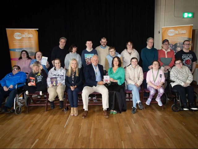 Lord Lieutenant Ian Crowe pictured with members of Stage Beyond Theatre Company during a visit to celebrate artistic director Dee Conaghan (centre) being awarded an OBE..jpg